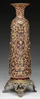 Decorated Vase by Mary Moser, All set against a cranberry glass background, offered Nov 2015