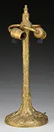 Tree Trunk Lamp Base by Tiffany Studios, Cast bronze tree trunk stem with round foot and cast root design, offered Jun 2016