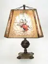 Knight Table Lamp by Handel, Shade rests atop a brass base with double socket, offered May 2003