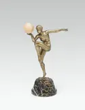Stella by Maurice Guiraud-Rivière, bronze, patinated; onyx ball; marble base; signed on the plinth "Guiraud.Riviere", offered Jun 2022