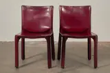 Mario Bellini, PAIR OF 'CAB 412' DINING CHAIRS FOR CASSINA, Red saddle leather over a steel and plastic frame with a zipper system