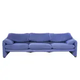 THREE SEAT 'MARALUNGA' SOFA FOR CASSINA by Vico Magistretti, Upholstered in periwinkle blue suede with adjustable head rests. Retains manufacturer tag, sold Jul 2025