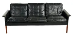 MODEL '500' THREE SEAT SOFA by Hans Olsen, Black leather on wooden frame, sold Sep 2020