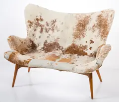 R161 SETTEE by Grant Featherston, In cowhide upholstery, sold Nov 2016