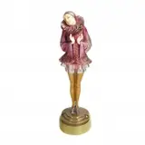 Paul Philippe, PIERRETTE COLD-PAINTED BRONZE AND IVORY FIGURE. Paul Philippe (1870-1930). Modelled, cast and carved as a female Pierrot, on onyx base. Signed Philippe, and foundry marks for Rosenthal und Maeder, Berlin France. Circa 1925. 8 H.