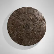 Adrian Pearsall, Wall-mounted disc bar, c. 1970, bronzed resin over wood, laminate, mirrored glass