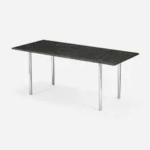 Dining table by Erwine & Estelle Laverne, c. 1957, granite, chrome-plated steel, sold Oct 2024