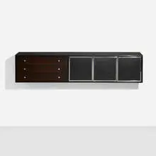 Wall-hanging cabinet by Modern, c. 1965, lacquered wood, walnut, laminate, chrome-plated brass, vinyl, sold Oct 2024