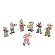 Overbeck Pottery, group of earthenware figurines, seven