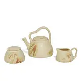 uncommon carved and painted earthenware three-piece tea service by Albert Frank Pons for Rookwood Pottery, sold Jun 2022