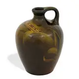 earthenware Standard Glaze whiskey jug by Mary Nourse for Rookwood Pottery, sold Jun 2022