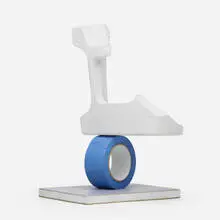 Matt Johnson, Still Life #2 (Balancing Styrofoam Corner on a Tape Roll), 2016, carved and painted wood