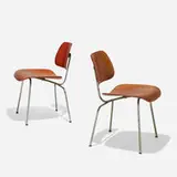 DCMs, pair by Charles and Ray Eames, aniline-dyed birch plywood, chrome-plated steel, rubber, sold Sep 2020