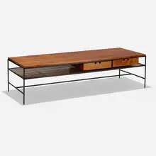 Planner Group coffee table, model 1584 by Paul McCobb, 1953, stained birch, enameled steel, rattan, sold Sep 2020