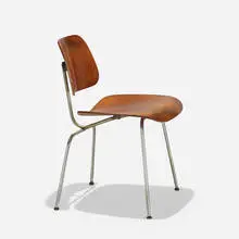 Charles and Ray Eames, DCM, 1946, molded ash plywood, chrome-plated steel, slunk skin, rubber