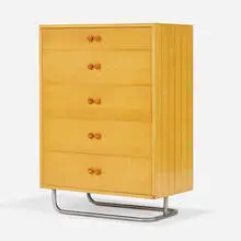 cabinet, model 3323 by Gilbert Rohde, 1933, white holly veneer with maple inlay, chrome-plated steel, Bakelite, sold Sep 2020