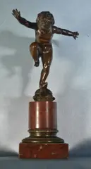 Otto Geyer, Niño Haciendo Equilibrio Sobre Una Tortuga, escultura de bronce con pátina marrón