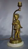 Joseph d'Asté, Niño Con Caracol, escultura de bronce dorado