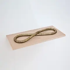Infinite edition by Lourival Cuquinha, 2012, moedas de 5 centavos de francos suíços e aço, offered Nov 2021
