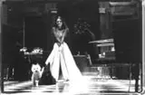 Mulher com Dois Cães by Tuca Reinés, Foto pb sobre papel, offered Sep 2020