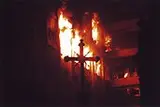 Caio Guatelli, Cruz e Fogo, 2002, Foto em cores sobre papel