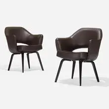 armchairs model 71, pair by Eero Saarinen, leather, lacquered wood, sold Sep 2020
