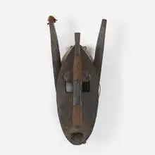 Kore Society Suruku (hyena) mask by Bamana, carved wood, steel, jute, sold Aug 2020