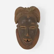Gu mask by Guro artist, carved and painted wood, sold Aug 2020