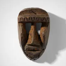 Dan or Guere, Kagle mask, carved wood, steel