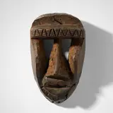 Dan or Guere, Kagle mask, carved wood, steel