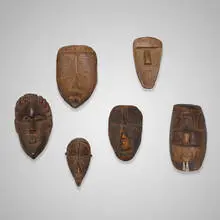 Ma Go (passport) masks, collection of six by Dan, carved wood, terracotta, sold Aug 2020