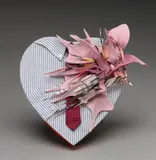James Rosenquist, Untitled, 1991, heart-shaped box top covered in shirt fabric, tie, plastic orchid and paper collage