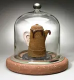Peter Zecher, Untitled (Vacuum Ground), enameled coffee pot, coffee grounds, glue, resin, glass, cement, and metal