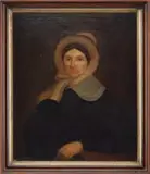 Unsigned, Portrait of a Woman, Oil on bed ticking half portrait of a woman wearing a fancy bonnet, black dress with lace collar