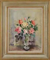 Nan Greacen, Roses in a Glass Vase, Oil on board table top still life scene shows a footed glass vase holding yellow, pink and red roses with green leaves