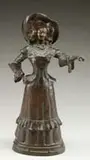 Jean-Victor Badin, Elegant Lady, Bronze figure of a woman dressed in finery with a large hat. She extends her hand out for assistance. Nice brown patina