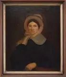 Unsigned, Portrait of a Woman, Oil on bed ticking half portrait of a woman wearing a fancy bonnet, black dress with lace collar