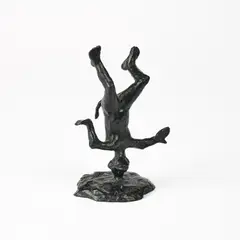 Affe auf dem Kopf stehend (Kopfschmerz/ Aspirin) by Jörg Immendorff, Um 2006, Bronze, schwarz patiniert, sold May 2025