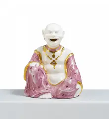 Sitzender Pagode by Meissen, Um 1720/25, Porzellan, goldfarben, leicht lüstrierend rosa und violett staffiert, sold May 2025