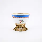Kumme mit Blumen by Meissen, Um 1800, Porzellan, farbig staffiert, gold dekoriert. Vergoldete Bronzemontierung, sold May 2025