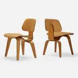 Charles and Ray Eames, DCWs, pair, molded ash plywood, leather, rubber