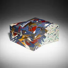 Lidded box by Ralph Bacerra, c. 1980, glazed and gilt porcelain, sold Oct 2024