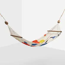 hammock by Alexander Calder, 1976, hand-woven cotton, jacaranda, zinc-plated steel, sold Jul 2020