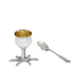Tiffany & Co., individual egg service: egg cup with talon feet, #6082 and spoon with bird's head terminal and talon bowl