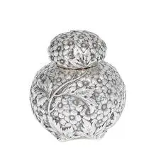 tea caddy with chased floral decoration throughout, #52 by Dominick and Haff, New York City, USA, sold Apr 2022