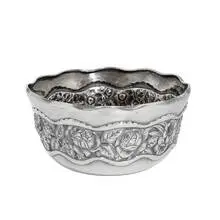 Whiting Mfg. Co., round bowl with undulating rim and repoussé floral decoration, #187, New York, USA