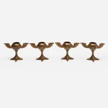 Guardian Nightlight candle holders, set of four by Mark Brazier-Jones, c. 1995, patinated bronze, sold Apr 2020