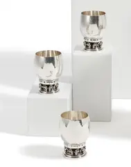 Folge von drei Bechern mit Traubendekor by Georg Jensen, Silber, sold Nov 2025