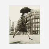 Carmen (Homage to Munkacsi), Coat by Cardin, Place François-Premier, Paris, August 1957 by Richard Avedon, gelatin silver print, sold Oct 2021
