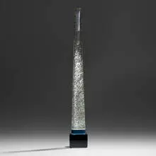 Tall candlestick by John Lewis, 1996, cast glass, sold Sep 2024